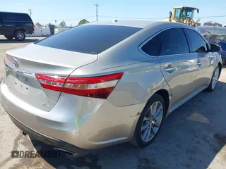 2014 Toyota Avalon Limited with VIN 4T1BK1EB5EU108760, listed as a IAAI auction lot 42148190 with 132,656 mi miles. Bid and sale history available at carsss.com. Image 4.