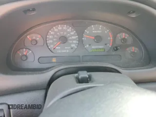 2002 Ford Mustang Deluxe с VIN 1FAFP44422F163443, выставлен на аукционе Copart как лот 57532435 с пробегом 209 356 миль миль и Списание • Salvage title. История ставок и продаж доступна на DreamBid. Изображение 9.