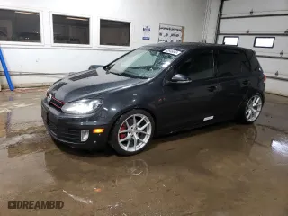 2013 Volkswagen GTI with VIN WVWGD7AJXDW129840, listed as a Copart auction lot 52946845 with 118,520 mi miles and Salvage Title. Bid and sale history available at carsss.com. Image 1.