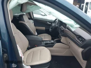 2020 Ford Escape Titanium with VIN 1FMCU9J98LUC00068, listed as a IAAI auction lot 41843755 with 42,525 mi miles and . Bid and sale history available at DreamBid. Image 5.