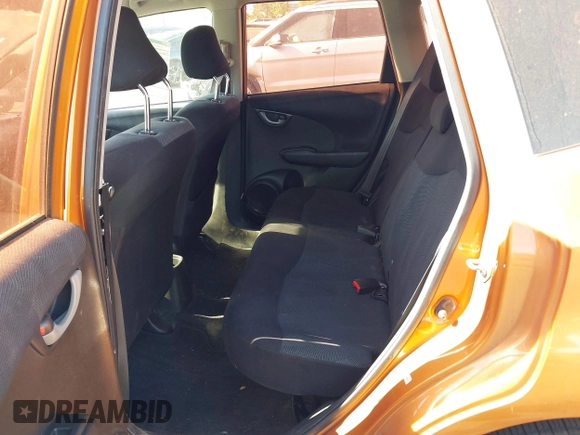 2011 Honda Fit Sport z VIN JHMGE8H59BS008957, wystawiony jako IAAI lot #42360019 z przebiegiem 158 975 mil mil oraz . Historia ofert i sprzedaży dostępna na DreamBid. Obrazek 8.