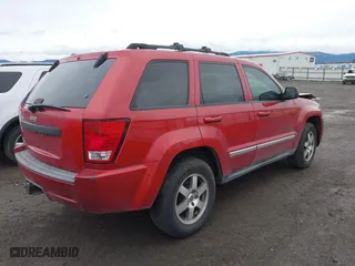 2009 Jeep Grand Cherokee Laredo with VIN 1J8GR48K99C549346, listed as a IAAI auction lot 41870627 with 170,949 mi miles. Bid and sale history available at carsss.com. Image 4.
