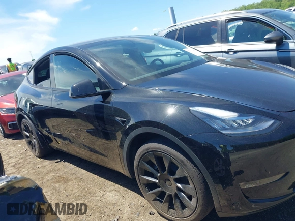 2022 Tesla Model Y Long Range z VIN 7SAYGDEE4NA006645, wystawiony jako IAAI lot #42192495 z przebiegiem 28 784 mil mil oraz . Historia ofert i sprzedaży dostępna na DreamBid. Obrazek 13.
