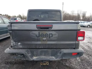 2021 Jeep Gladiator Willys with VIN 1C6HJTAGXML502037, listed as a IAAI auction lot 41225448 with 53,154 mi miles and . Bid and sale history available at carsss.com. Image 17.