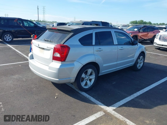 2011 Dodge Caliber Mainstreet with VIN 1B3CB3HA2BD117839, listed as a IAAI auction lot 42101103 with 142,099 mi miles. Bid and sale history available at carsss.com. Image 4.