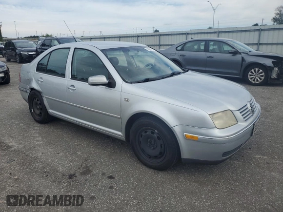 2004 Volkswagen Jetta GL with VIN 3VWRR69M34M108439, listed as a Copart auction lot 74029704 with 296,984 mi miles and Salvage title. Bid and sale history available at DreamBid. Image 4.