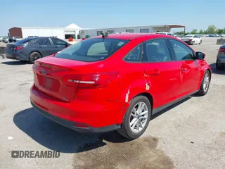 2016 Ford Focus SE with VIN 1FADP3F2XGL205797, listed as a IAAI auction lot 41987209 with 129,042 mi miles. Bid and sale history available at carsss.com. Image 4.