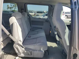 2004 Ford Freestar SE с VIN 2FMZA51684BA91698, выставлен на аукционе Copart как лот 51982115 с пробегом 91 564 миль миль и Списание • Salvage title. История ставок и продаж доступна на DreamBid. Изображение 10.