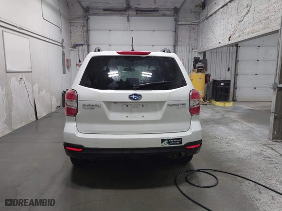 2014 Subaru Forester 2.5i Premium with VIN JF2SJAECXEH528301, listed as a IAAI auction lot 42020441 with 56,677 mi miles. Bid and sale history available at carsss.com. Image 16.