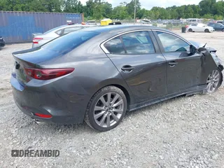 2021 Mazda 3 Preferred with VIN JM1BPBCL8M1330247, listed as a IAAI auction lot 42491066 with Not provided miles and . Bid and sale history available at DreamBid. Image 4.