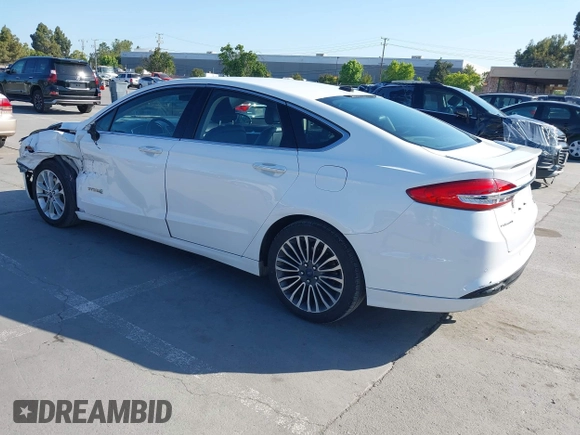 2017 Ford Fusion Hybrid Titanium с VIN 3FA6P0RU3HR323164, выставлен на аукционе IAAI как лот 42303571 с пробегом 119 732 миль миль и . История ставок и продаж доступна на DreamBid. Изображение 3.