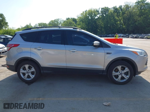 2013 Ford Escape SE z VIN 1FMCU0GX3DUC23910, wystawiony jako IAAI lot #42245926 z przebiegiem 159 076 mil mil oraz . Historia ofert i sprzedaży dostępna na DreamBid. Obrazek 14.