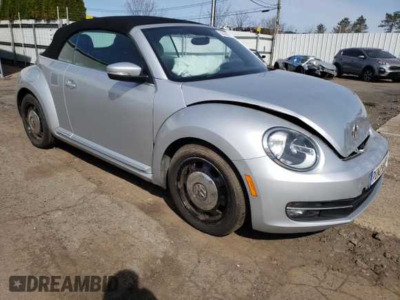 2013 Volkswagen Beetle 2.5L with VIN 3VW5P7AT0DM821280, listed as a Copart auction lot 53565635 with 94,969 mi miles and Salvage Title. Bid and sale history available at DreamBid. Image 4.
