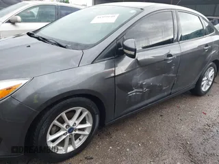 2015 Ford Focus SE with VIN 1FADP3F28FL219552, listed as a IAAI auction lot 41959648 with 128,590 mi miles. Bid and sale history available at carsss.com. Image 6.