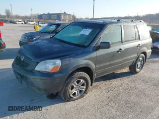 2005 Honda Pilot EX-L with VIN 5FNYF18505B036545, listed as a IAAI auction lot 41633967 with 184,038 mi miles. Bid and sale history available at carsss.com. Image 4.