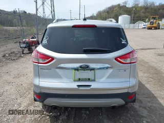 2016 Ford Escape Titanium with VIN 1FMCU9JX3GUA62802, listed as a IAAI auction lot 42001690 with 124,452 mi miles. Bid and sale history available at carsss.com. Image 16.
