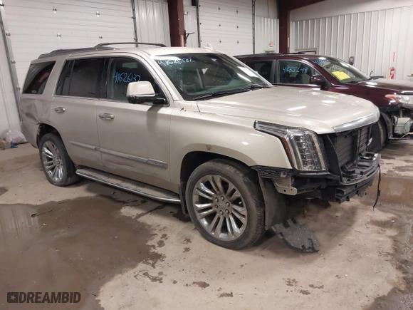 2017 Cadillac Escalade Premium Luxury with VIN 1GYS4CKJ9HR390988, listed as a IAAI auction lot 41626132 with 166,185 mi miles. Bid and sale history available at carsss.com. Image 1.
