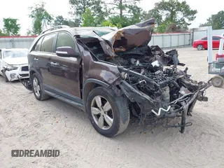 2012 Kia Sorento EX with VIN 5XYKU4A21CG248227, listed as a IAAI auction lot 42036333 with 1 mi miles. Bid and sale history available at carsss.com. Image 1.