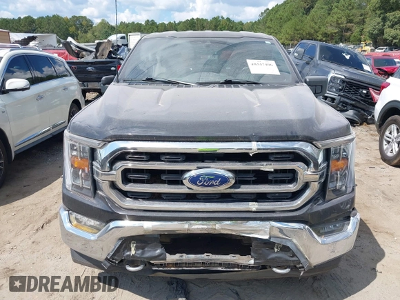 2021 Ford F-150 XL with VIN 1FTFW1E5XMKE21429, listed as a IAAI auction lot 40347406 with 125,000 mi miles. Bid and sale history available at carsss.com. Image 12.