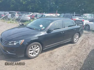 2016 Volkswagen Passat S with VIN 1VWAT7A30GC058676, listed as a IAAI auction lot 39978574 with Not provided miles and . Bid and sale history available at DreamBid. Image 2.