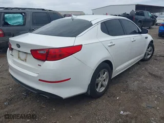2015 Kia Optima LX with VIN KNAGM4A75F5632779, listed as a IAAI auction lot 41701231 with 174,458 mi miles. Bid and sale history available at carsss.com. Image 4.