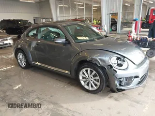 2018 Volkswagen Beetle S with VIN 3VWFD7AT6JM703758, listed as a IAAI auction lot 41381842 with 1 mi miles. Bid and sale history available at carsss.com. Image 1.