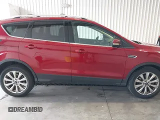 2017 Ford Escape Titanium with VIN 1FMCU9J91HUA32264, listed as a IAAI auction lot 42050273 with 201,128 mi miles. Bid and sale history available at carsss.com. Image 13.