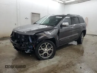 2021 Jeep Grand Cherokee 80th Anniversary with VIN 1C4RJFBG4MC503925, listed as a Copart auction lot 86176384 with 69,765 mi miles and Salvage Title. Bid and sale history available at carsss.com. Image 1.