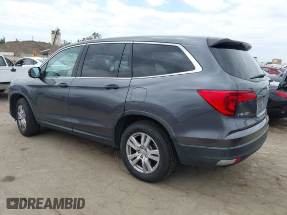 2016 Honda Pilot LX with VIN 5FNYF5H14GB037205, listed as a IAAI auction lot 42034018 with 101,943 mi miles and . Bid and sale history available at DreamBid. Image 3.