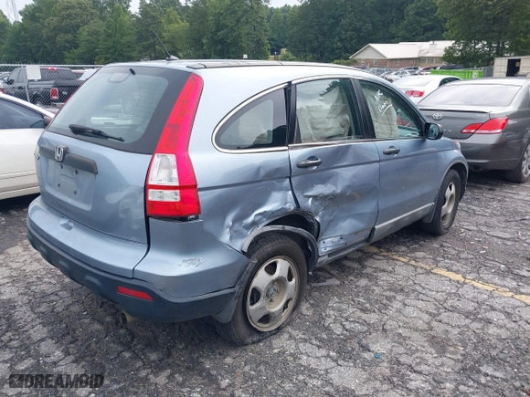 2008 Honda CR-V LX with VIN 3CZRE38348G700954, listed as a IAAI auction lot 37268497 with 140,121 mi miles. Bid and sale history available at carsss.com. Image 4.