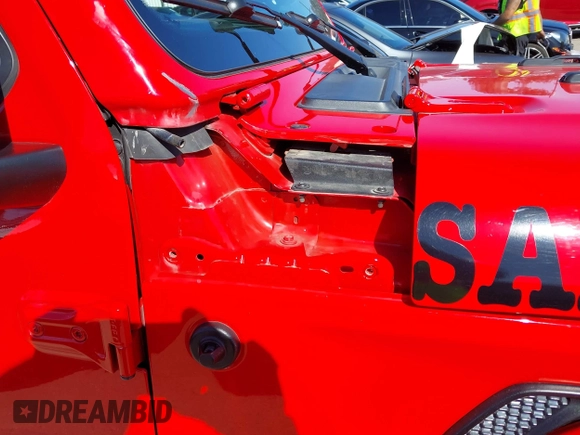 2022 Jeep Gladiator Willys Sport z VIN 1C6HJTAG0NL180848, wystawiony jako IAAI lot #41778129 z przebiegiem Nie podano mil oraz . Historia ofert i sprzedaży dostępna na DreamBid. Obrazek 20.