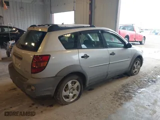 2003 Pontiac Vibe with VIN 5Y2SL62833Z443877, listed as a IAAI auction lot 42071403 with 171,386 mi miles. Bid and sale history available at carsss.com. Image 4.