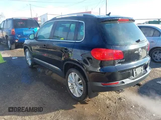 2016 Volkswagen Tiguan S with VIN WVGBV7AX3GW522378, listed as a IAAI auction lot 41391294 with 106,278 mi miles and . Bid and sale history available at DreamBid. Image 3.