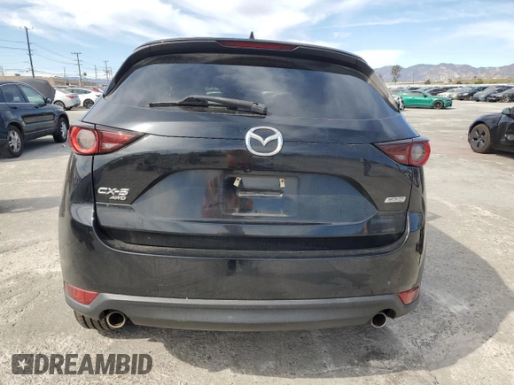2018 Mazda CX-5 Touring z VIN JM3KFBCM4J0444167, wystawiony jako Copart lot #45900645 z przebiegiem 85 881 mil mil oraz Czysty tytuł • Clean title. Historia ofert i sprzedaży dostępna na DreamBid. Obrazek 6.