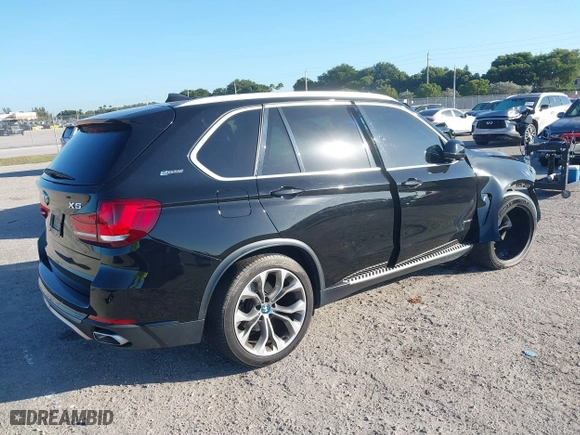 2018 BMW X5 xDrive40e iPerformance with VIN 5UXKT0C59J0W00801, listed as a IAAI auction lot 41081133 with 63,265 mi miles. Bid and sale history available at carsss.com. Image 4.