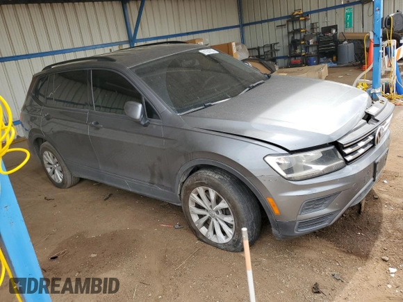 2018 Volkswagen Tiguan S with VIN 3VV1B7AXXJM054778, listed as a Copart auction lot 61294795 with 87,330 mi miles and Salvage title. Bid and sale history available at DreamBid. Image 4.
