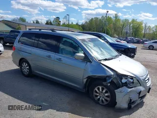 2010 Honda Odyssey EX-L with VIN 5FNRL3H74AB046578, listed as a IAAI auction lot 42049213 with 218,457 mi miles. Bid and sale history available at carsss.com. Image 1.