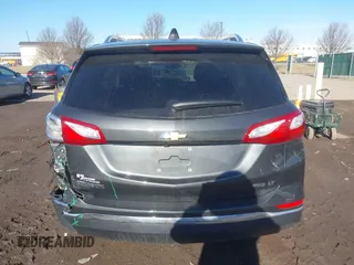 2018 Chevrolet Equinox LT z VIN 2GNAXSEV2J6122861, wystawiony jako IAAI lot #41741471 z przebiegiem 121 123 mil mil oraz . Historia ofert i sprzedaży dostępna na DreamBid. Obrazek 16.