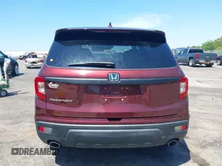 2019 Honda Passport EX-L with VIN 5FNYF7H59KB009956, listed as a IAAI auction lot 42021317 with 58,121 mi miles and . Bid and sale history available at DreamBid. Image 16.