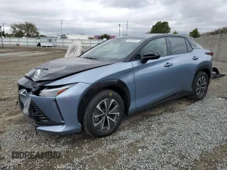 2023 Lexus RZ with VIN JTJAAAAB6PA009956, listed as a Copart auction lot 48707855 with 6,736 mi miles and Salvage Title. Bid and sale history available at carsss.com. Image 1.