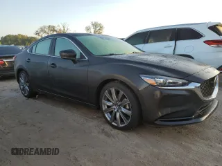 2021 Mazda 6 Touring with VIN JM1GL1VM7M1614986, listed as a Copart auction lot 73731794 with Not Provided miles and Salvage Title. Bid and sale history available at DreamBid. Image 4.
