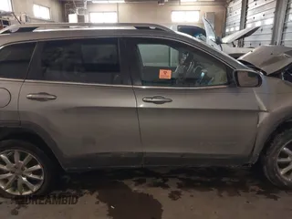 2015 Jeep Cherokee Limited with VIN 1C4PJLDB0FW505891, listed as a IAAI auction lot 41620674 with 120,804 mi miles and . Bid and sale history available at DreamBid. Image 13.