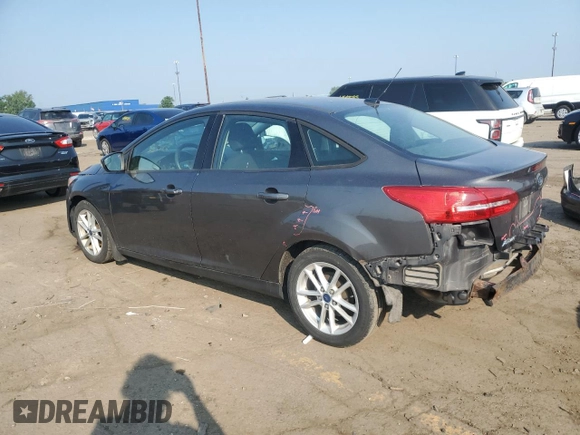 2015 Ford Focus SE with VIN 1FADP3F22FL289838, listed as a Copart auction lot 60606615 with 157,870 mi miles and Clean title. Bid and sale history available at DreamBid. Image 2.