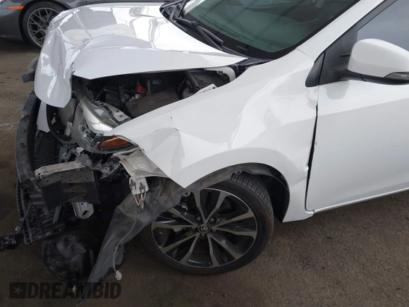 2019 Toyota Corolla L with VIN 5YFBURHE7KP862111, listed as a IAAI auction lot 42205368 with 96,823 mi miles and . Bid and sale history available at DreamBid. Image 18.