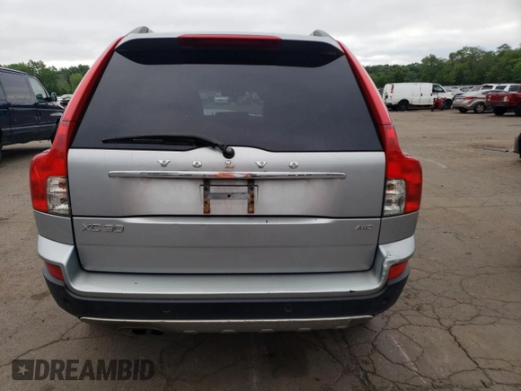 2012 Volvo XC90 z VIN YV4952CZ0C1618347, wystawiony jako Copart lot #64658345 z przebiegiem 157 326 mil mil oraz Szkoda całkowita • Salvage title. Historia ofert i sprzedaży dostępna na DreamBid. Obrazek 6.