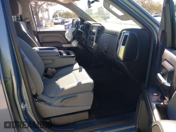 2016 Chevrolet Silverado 1500 LT with VIN 3GCUKREC8GG219524, listed as a IAAI auction lot 41087657 with 123,010 mi miles and . Bid and sale history available at DreamBid. Image 5.