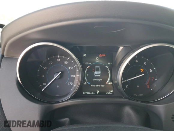 2018 Jaguar F-Pace 25t Premium with VIN SADCJ2FX6JA267072, listed as a Copart auction lot 52867035 with 77,057 mi miles and Salvage Title. Bid and sale history available at DreamBid. Image 9.