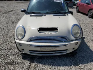 2006 MINI Hardtop with VIN WMWRC33586TJ77908, listed as a Copart auction lot 55095525 with 143,810 mi miles and Salvage title. Bid and sale history available at DreamBid. Image 11.