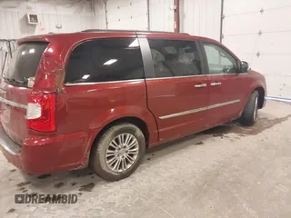2015 Chrysler Town & Country Touring L with VIN 2C4RC1CG8FR525304, listed as a IAAI auction lot 41829438 with 125,587 mi miles and . Bid and sale history available at DreamBid. Image 4.