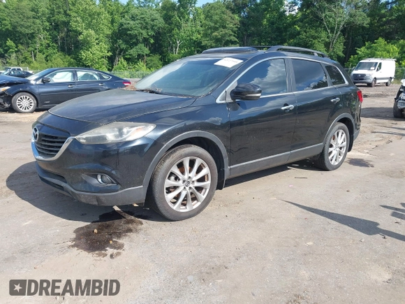 2015 Mazda CX-9 Grand Touring with VIN JM3TB2DA4F0464186, listed as a IAAI auction lot 42227595 with 124,526 mi miles and . Bid and sale history available at DreamBid. Image 17.